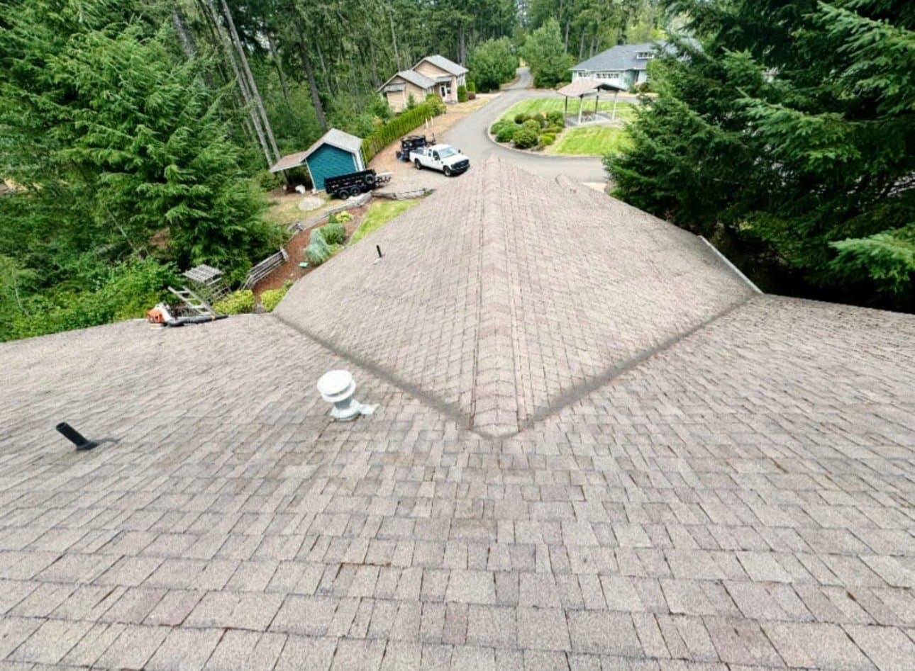 Aerial view of a roof ridge and surrounding property